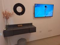 TV a/nebo společenská místnost v ubytování Paramount Gardens Resorts D204