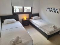 Postel nebo postele na pokoji v ubytování Paramount Gardens Resorts D204