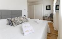 Posteľ alebo postele v izbe v ubytovaní Villa Lux