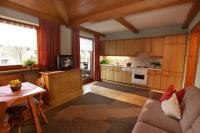 A kitchen or kitchenette at Gästehaus Hölzl