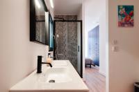a bathroom with a sink and a shower at Prestigious villa with panoramic sea view in Bandol
