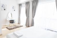 Postel nebo postele na pokoji v ubytování Bahar JBR Apartment by HAPPY SEASON