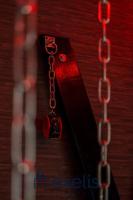 a red light hanging from a chain on a wall at Cure d&#39;Air en amoureux in Nancy