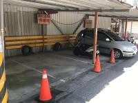 a car parked in a parking lot with orange cones at Love in Hualien B&amp;B in Hualien City