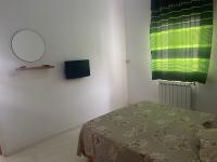 TV a/nebo společenská místnost v ubytování NN Residence Tabarka