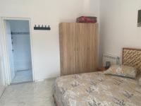 Postel nebo postele na pokoji v ubytování NN Residence Tabarka