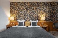 Łóżko lub łóżka w pokoju w obiekcie Hotel Rader