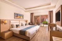 Postel nebo postele na pokoji v ubytování Pickalbatros Alf Leila Wa Leila Resort - Neverland Hurghada
