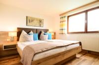 A bed or beds in a room at Lammerauhof