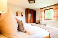 A bed or beds in a room at Lammerauhof