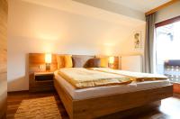 A bed or beds in a room at Lammerauhof