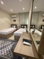 Postel nebo postele na pokoji v ubytování Locanda Pyramids Hotel