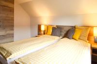 A bed or beds in a room at Lammerauhof
