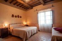 Posteľ alebo postele v izbe v ubytovaní Agriturismo Tenuta Roccaccia