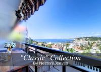 a balcony with a view of the ocean at Nestor&amp;Jeeves - HUBLOT TERRASSE - Sea view - swimming pool in Nice