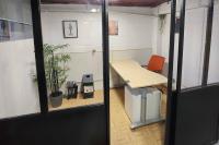 an office with a desk and a chair in a room at Maison proche Paris JO 2024 in Franconville