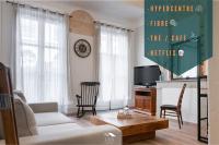 Televízia a/alebo spoločenská miestnosť v ubytovaní Magnolia magnifique T2 entièrement rénové.