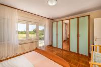 Posteľ alebo postele v izbe v ubytovaní Holiday home in Jadranovo 33199