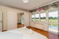 Posteľ alebo postele v izbe v ubytovaní Holiday home in Jadranovo 33199