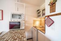 Kuchnia lub aneks kuchenny w obiekcie Les Carroz D'araches 4 personnes