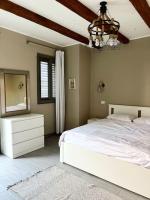 Postel nebo postele na pokoji v ubytování 1BR villa - private heated pool in Bali ElGouna