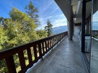 a balcony with a view of the mountains at Appartement Pra-Loup, 3 pièces, 6 personnes - FR-1-165A-54 in Uvernet