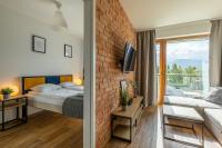 Posteľ alebo postele v izbe v ubytovaní RentPlanet - Apartamenty Schroniskowa