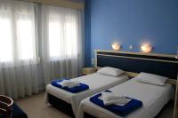 Posteľ alebo postele v izbe v ubytovaní Hôtel Argo