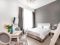 Postel nebo postele na pokoji v ubytování Apartamenty Bonerowska 5