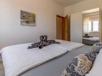 Posteľ alebo postele v izbe v ubytovaní Apartment in Banjole near Beach