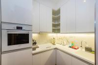 Kuchyň nebo kuchyňský kout v ubytování Bellevue Apartment