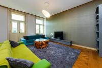 TV a/nebo společenská místnost v ubytování Bellevue Apartment