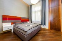 Postel nebo postele na pokoji v ubytování Bellevue Apartment