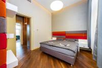 Postel nebo postele na pokoji v ubytování Bellevue Apartment