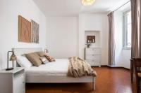 Posteľ alebo postele v izbe v ubytovaní Trevi Fountain House Deluxe