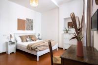 Posteľ alebo postele v izbe v ubytovaní Trevi Fountain House Deluxe