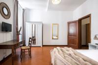 Posteľ alebo postele v izbe v ubytovaní Trevi Fountain House Deluxe