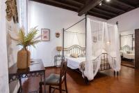 Posteľ alebo postele v izbe v ubytovaní Trevi Fountain House Deluxe