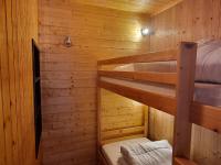 Una cama o camas cuchetas en una habitaci&oacute;n  de Studio Plagne Aime 2000, 1 pi&egrave;ce, 4 personnes - FR-1-181-2558