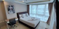 Postel nebo postele na pokoji v ubytování Grand Avenue Pattaya - Luxury Suite - 2 bedroom 2 baths - Pool-view