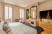Tempat tidur dalam kamar di Appartement Concorde, rue Royale - 8 places