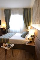 Posteľ alebo postele v izbe v ubytovaní LH Hotel Sirio Venice