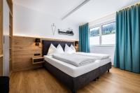 Łóżko lub łóżka w pokoju w obiekcie Appartements Evers