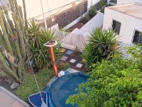 Zahrada ubytování Apartamento 2 dormitorios cerca de la playa en Puerto del Carmen