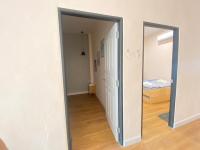 Postel nebo postele na pokoji v ubytování COZY HOME @BETONG