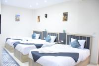 Postel nebo postele na pokoji v ubytování Locanda Pyramids Hotel