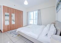 Postel nebo postele na pokoji v ubytování StoneTree - Spacious 1BR - Best Location for Tourist