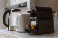 a coffee maker sitting on a counter in a kitchen at Appartement entier au coeur de Nogent Sur Marne in Nogent-sur-Marne