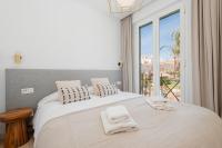 Posteľ alebo postele v izbe v ubytovaní Holiday House next to the beach in Las Dunas, Bahía de Marbella