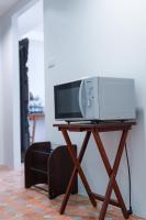 ChomTique Hotelにあるテレビまたはエンターテインメントセンター